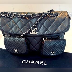 CHANEL
Vintage Black Quilted Lambskin
Medium Multi Pocket
Bag - Silver Accents